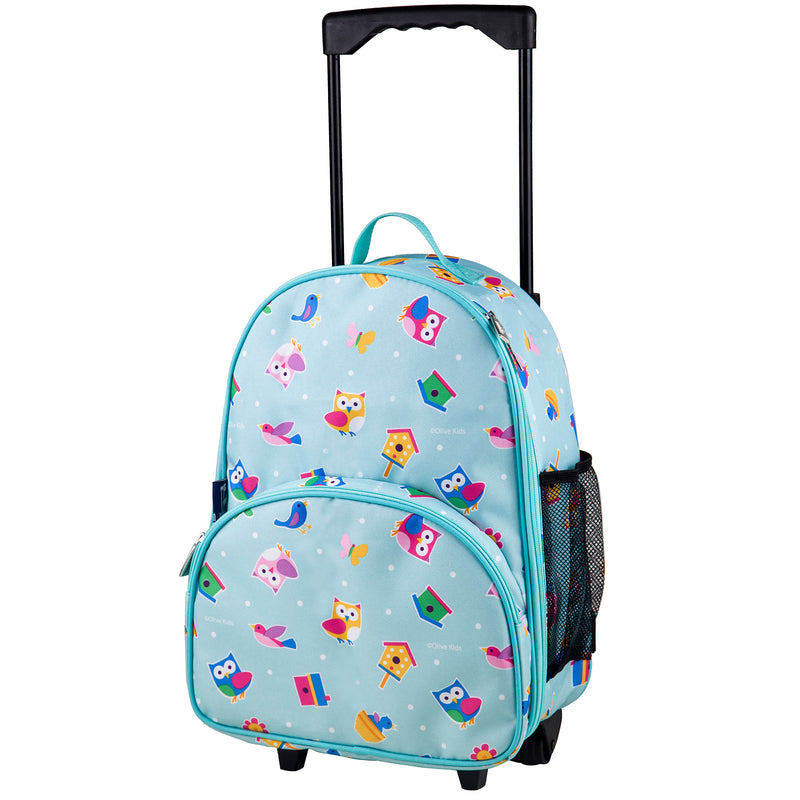 Little girl rolling luggage online